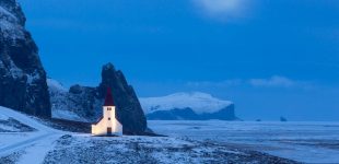 Full moon over Vik church, Iceland